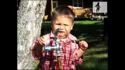 19340-Cute-Funny-Gif-Of-A-Kid-Trying-To-Drink-From-A-Water-Fountain.gif